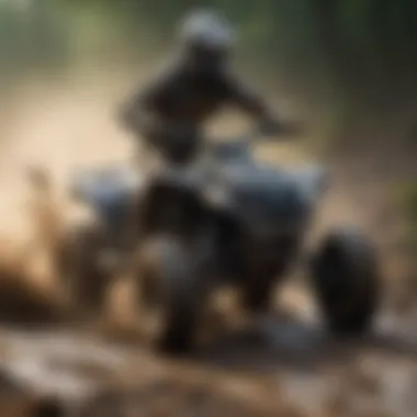 ATV rider racing through muddy track