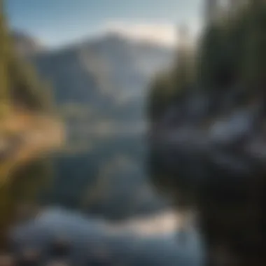 Reflective Lake Amidst Mountain Backdrop Crystal clear lake reflecting the surrounding mountains