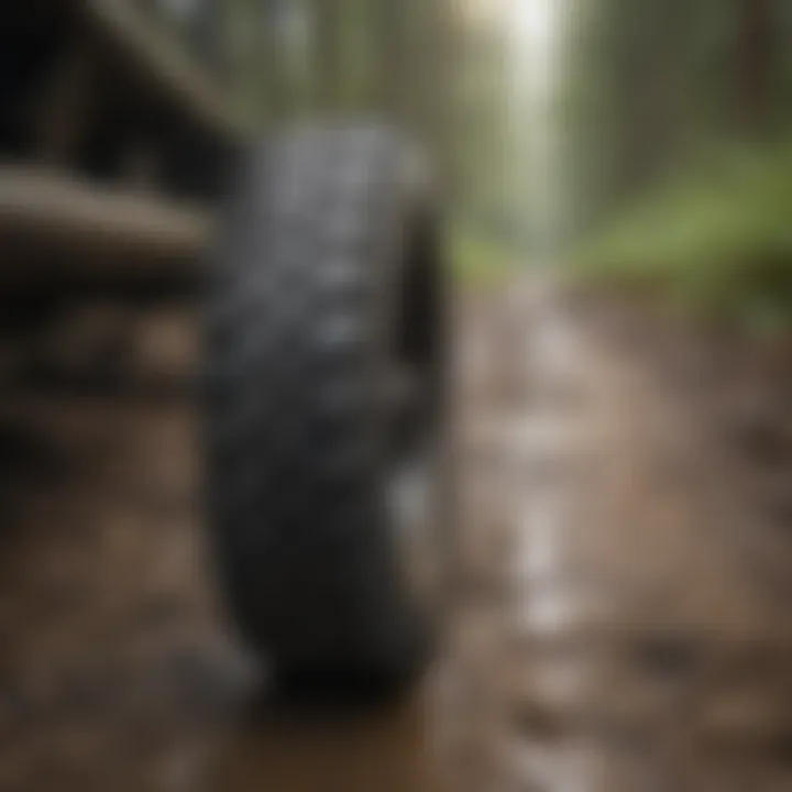 Close-up of tire treading on muddy offroad trail in Washington