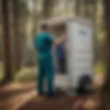 Sanitation Specialist cleaning portable restroom