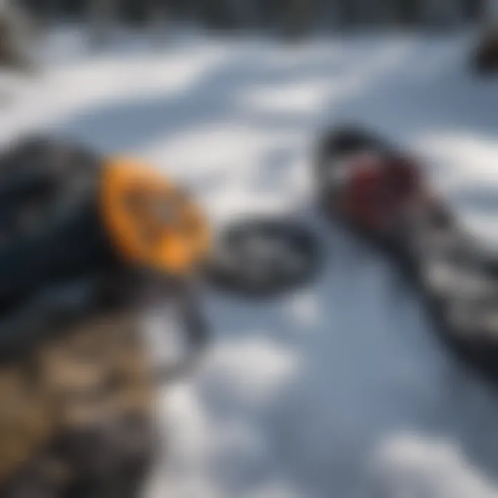 Close-up of snowshoe gear laid out on a snowy surface