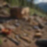 An array of gold prospecting tools laid out on a rugged landscape