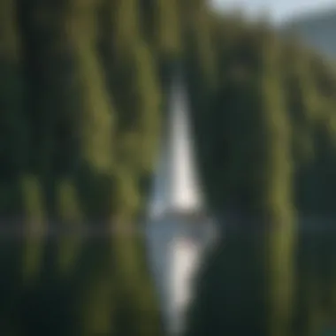 Sailboat Gracefully Gliding on Flathead Lake Sailboat gracefully gliding on Flathead Lake's crystal-clear waters