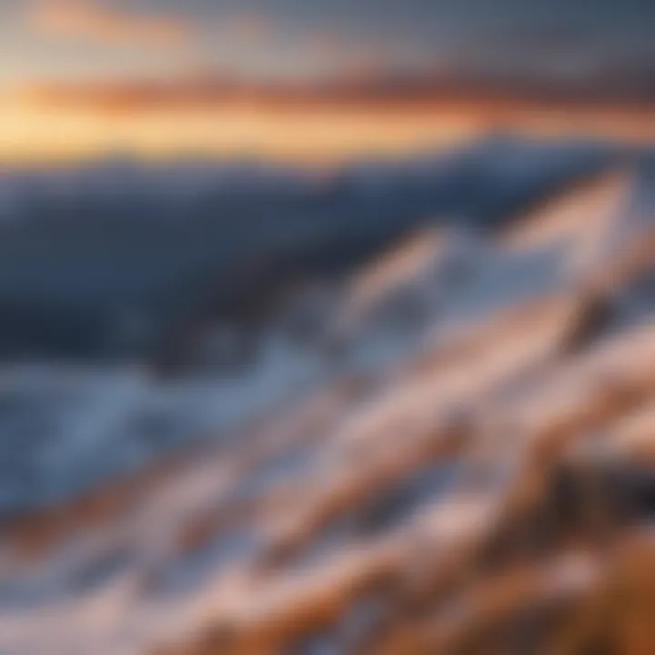 Panoramic view of snow-capped mountains at sunset