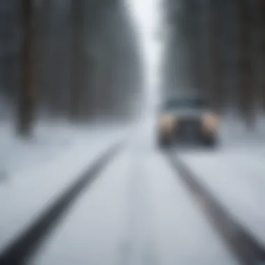 Tips for Safe Driving in Snowy Conditions Snow-covered road with tire tracks visible