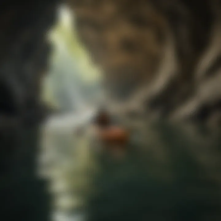 Kayaker paddling through underground river